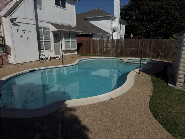 a view of outdoor space yard and swimming pool