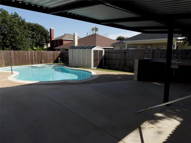 a storage room with washer and dryer