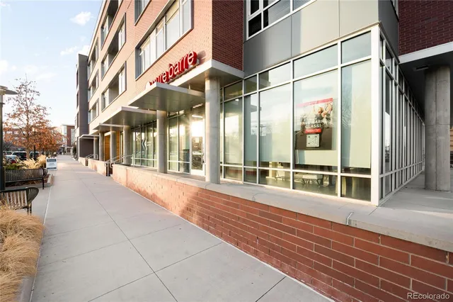 a view of a building with a street