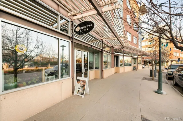 a view of a building with a street