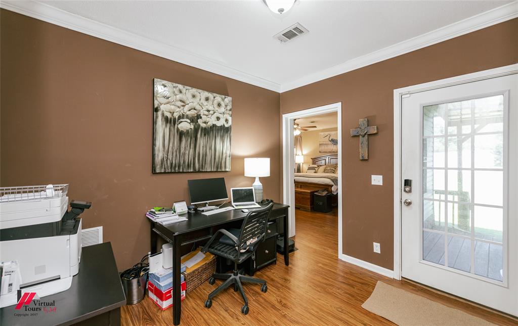 12501 Rust Lane Keithville, LA 71047 - Photo 17 of 39 a workspace with furniture and a window