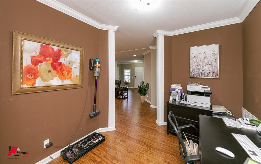 12501 Rust Lane Keithville, LA 71047 - Photo 18 of 39 a room with furniture and wooden floor