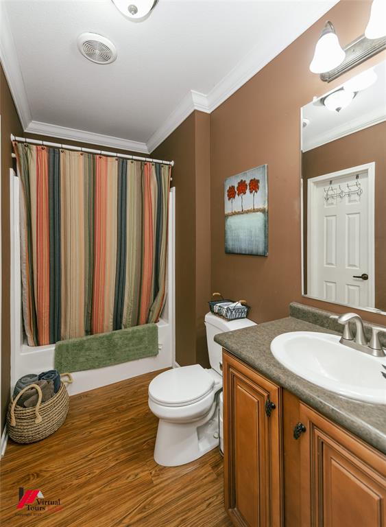 12501 Rust Lane Keithville, LA 71047 - Photo 27 of 39 a bathroom with a granite countertop sink and a mirror
