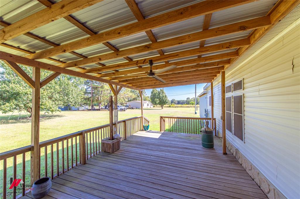 12501 Rust Lane Keithville, LA 71047 - Photo 38 of 39 a view of a balcony with wooden floor