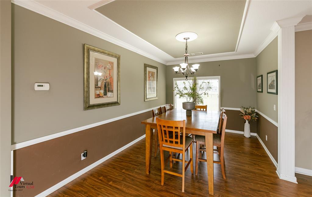 12501 Rust Lane Keithville, LA 71047 - Photo 6 of 39 a view of a dining room with furniture window and wooden floor