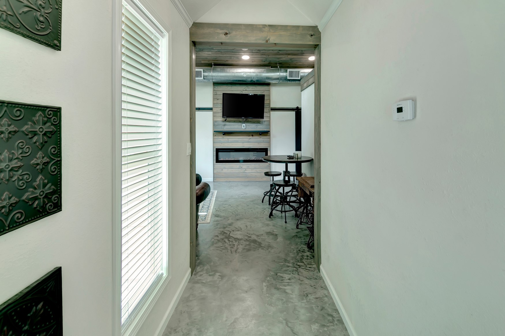 1002 2nd Street Ganado, TX 77962 - Photo 32 of 50 Hallway to back porch & addition