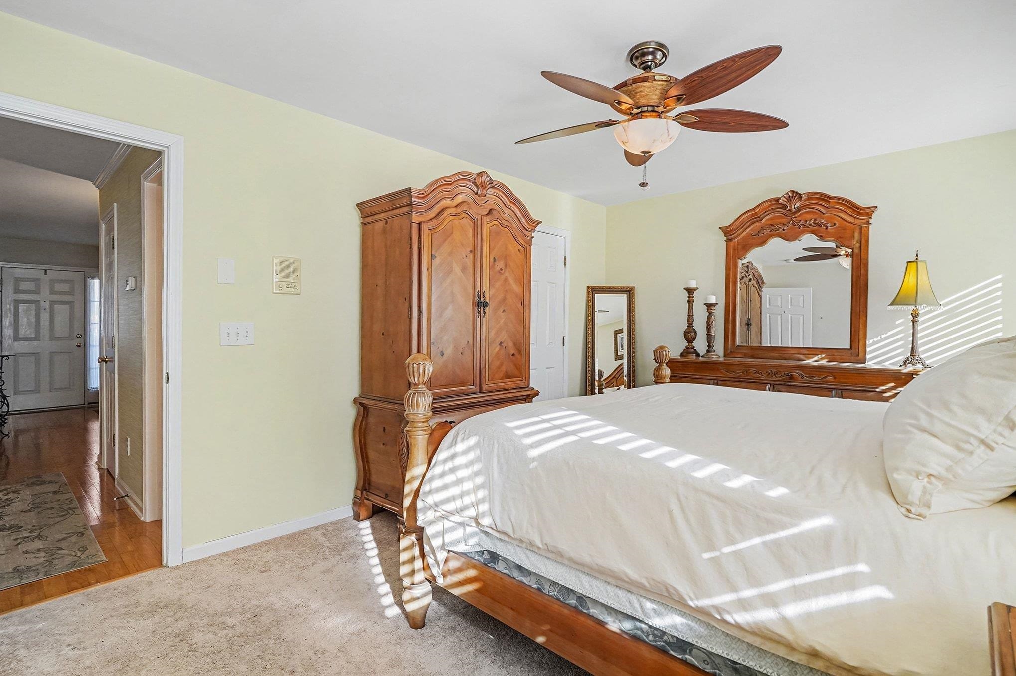 3425 Arrowhead Boulevard Myrtle Beach, SC 29579 - Photo 14 of 38 Bedroom featuring a ceiling fan and light carpet