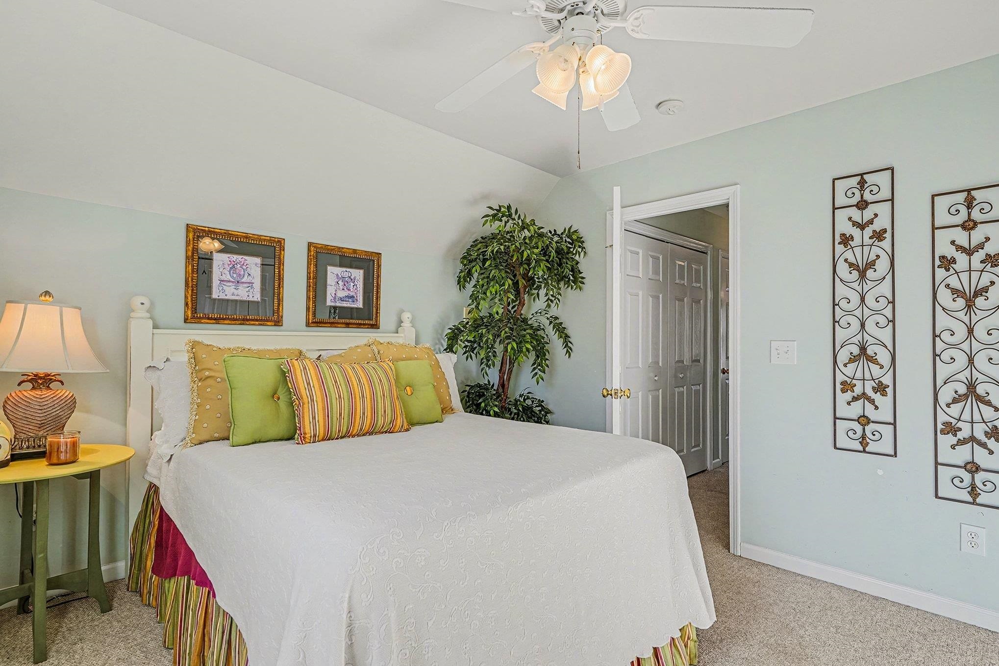 3425 Arrowhead Boulevard Myrtle Beach, SC 29579 - Photo 24 of 38 Bedroom with light carpet, a ceiling fan, and vaulted ceiling