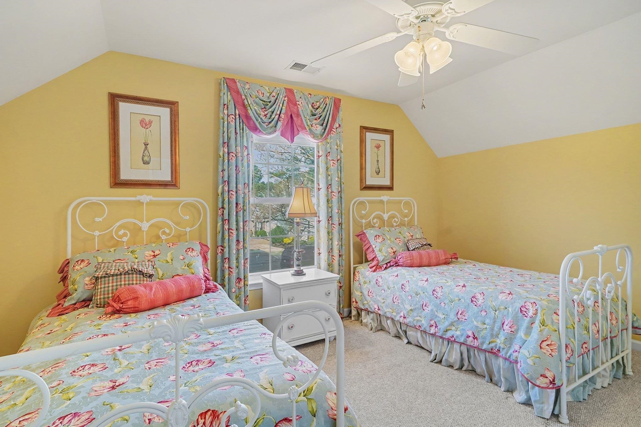 3425 Arrowhead Boulevard Myrtle Beach, SC 29579 - Photo 26 of 38 Carpeted bedroom with lofted ceiling and ceiling fan