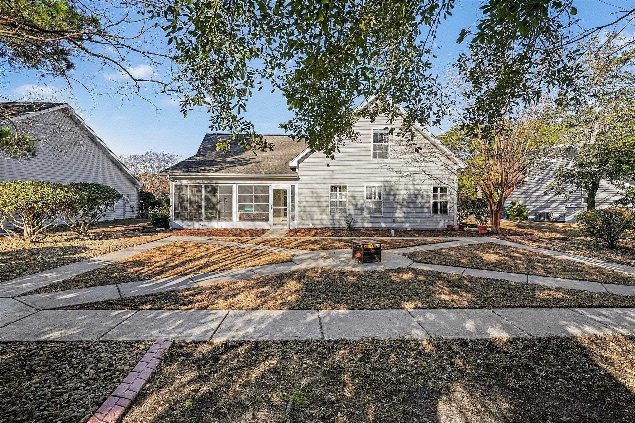 3425 Arrowhead Boulevard Myrtle Beach, SC 29579 - Photo 30 of 38 Rear view of property with a sunroom