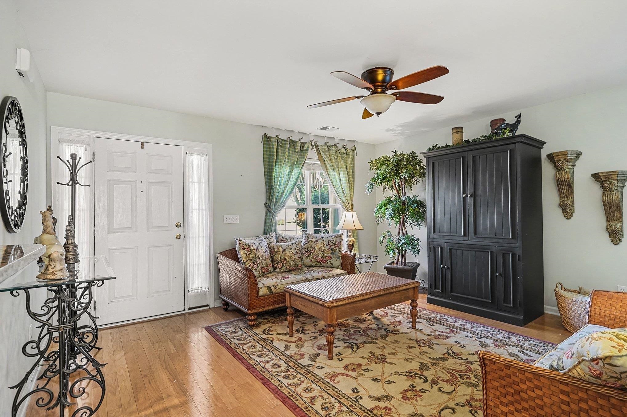 3425 Arrowhead Boulevard Myrtle Beach, SC 29579 - Photo 4 of 38 Living room featuring light wood finished floors and ceiling fan