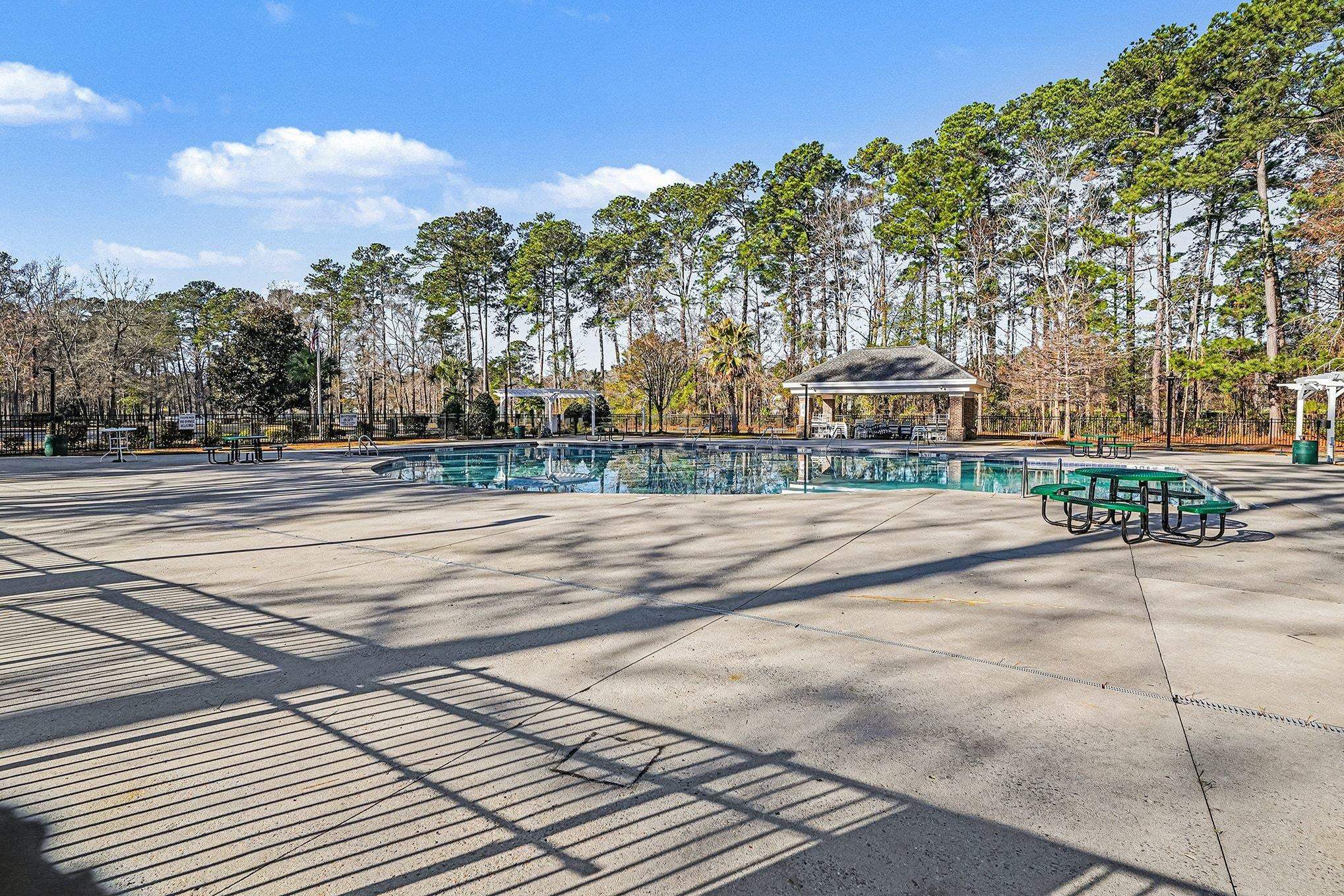 3425 Arrowhead Boulevard Myrtle Beach, SC 29579 - Photo 43 of 51 Community pool featuring a patio and view of scattered trees