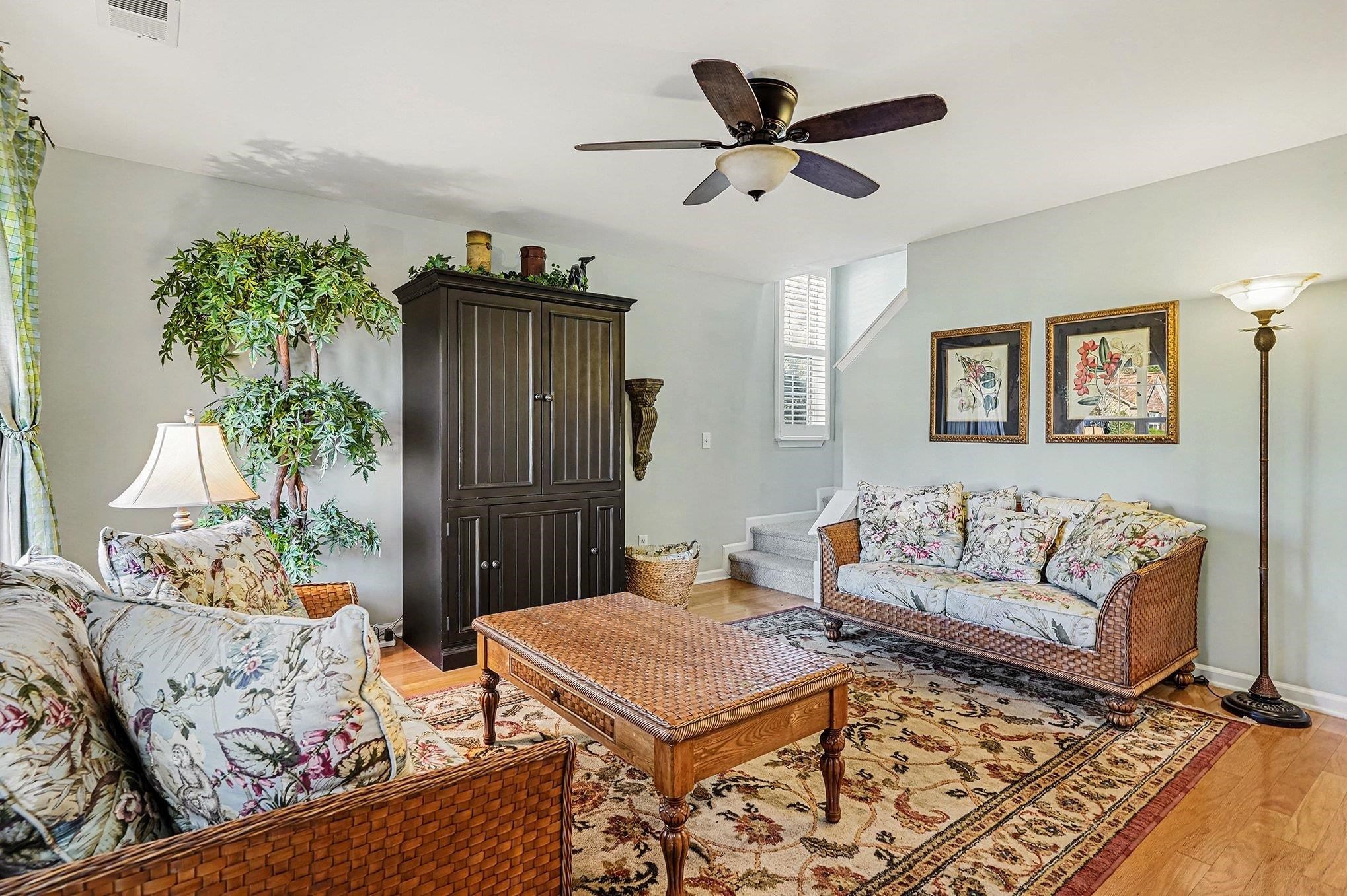3425 Arrowhead Boulevard Myrtle Beach, SC 29579 - Photo 6 of 38 Living area featuring stairway, light wood-type flooring, and a ceiling fan