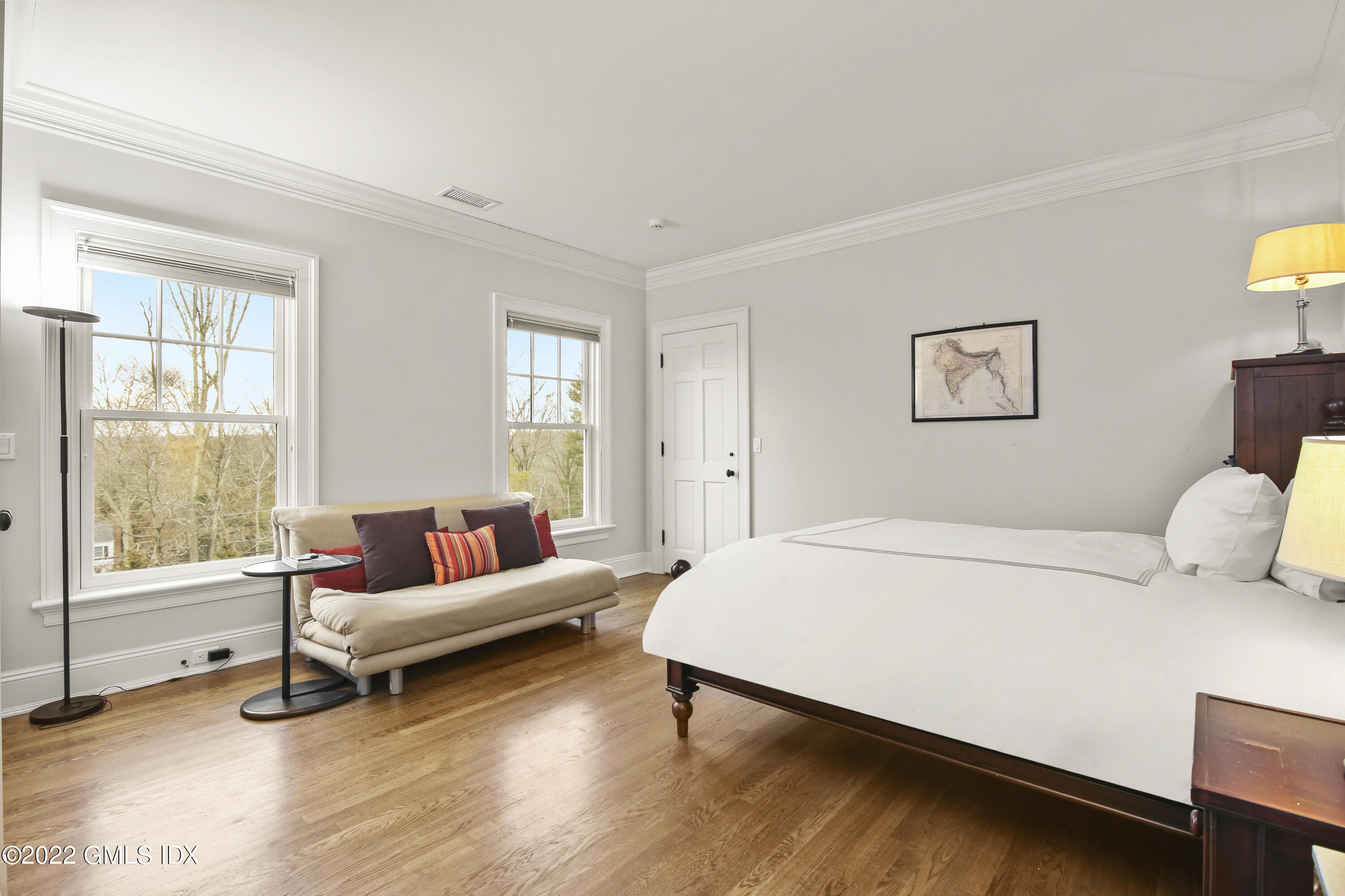 807 Lake Avenue Greenwich, CT 06830 - Photo 16 of 31 a bedroom with a bed and a window