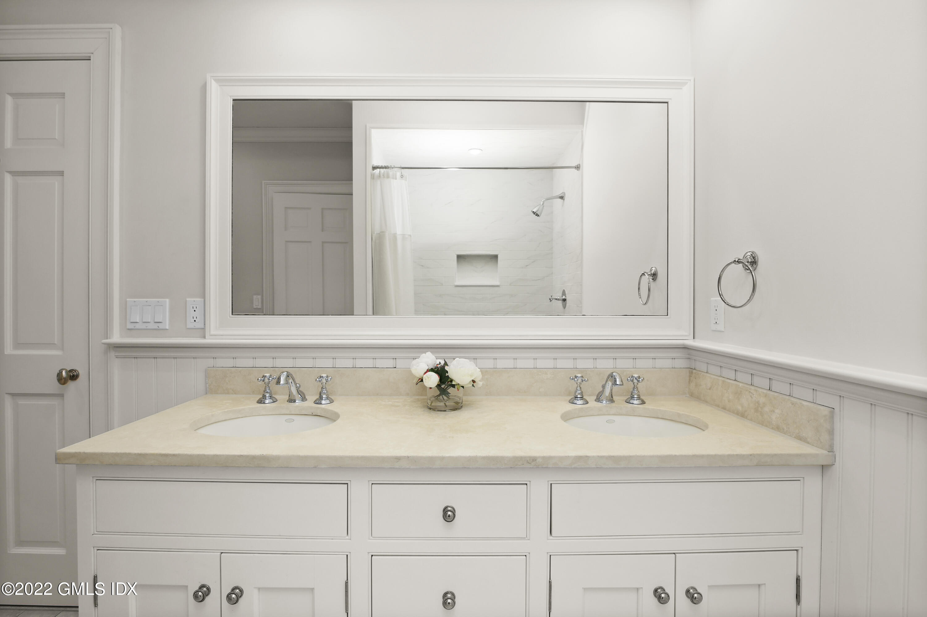 807 Lake Avenue Greenwich, CT 06830 - Photo 19 of 31 a bathroom with a sink and a mirror