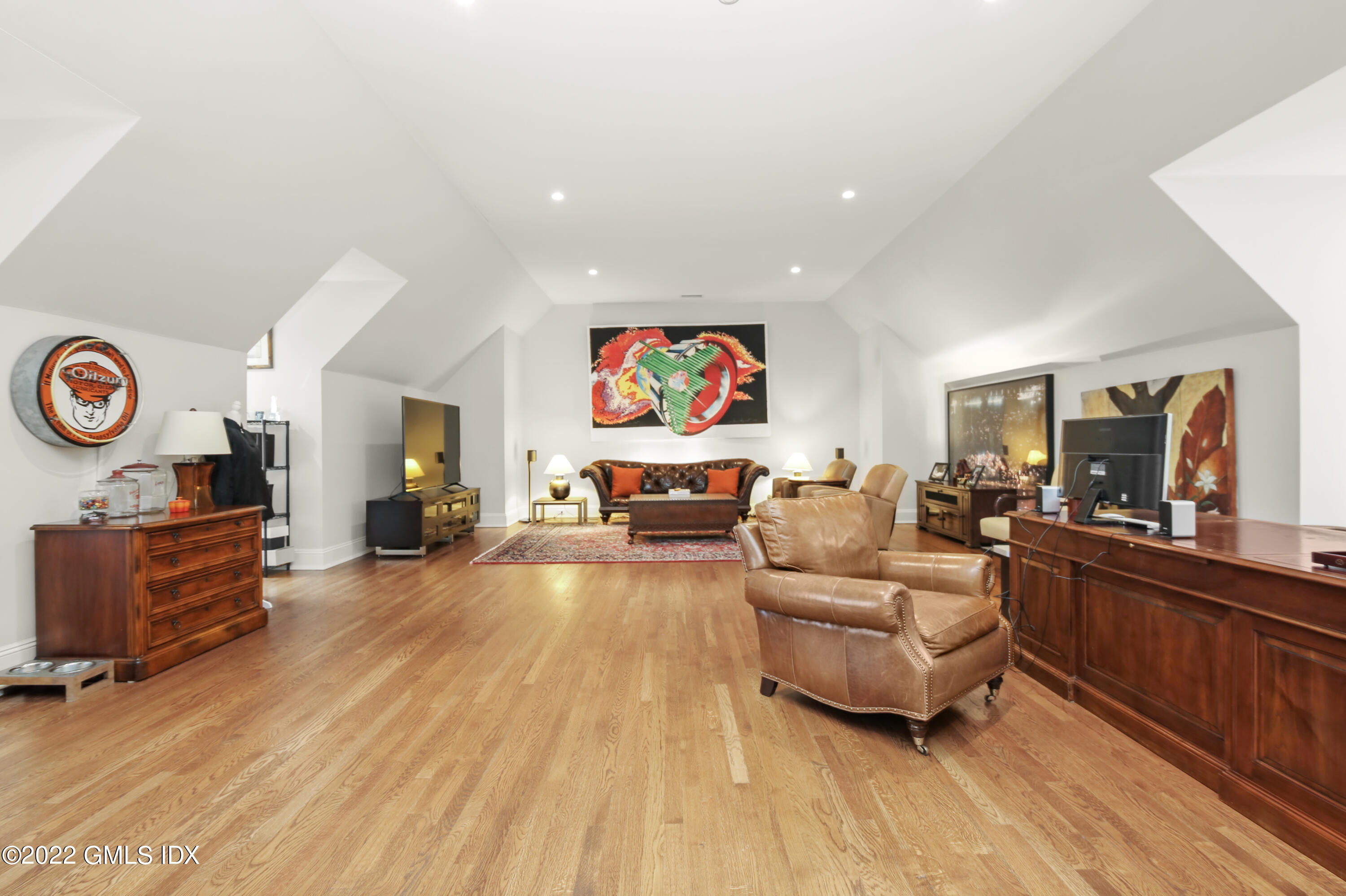 807 Lake Avenue Greenwich, CT 06830 - Photo 20 of 31 a living room with furniture and a flat screen tv