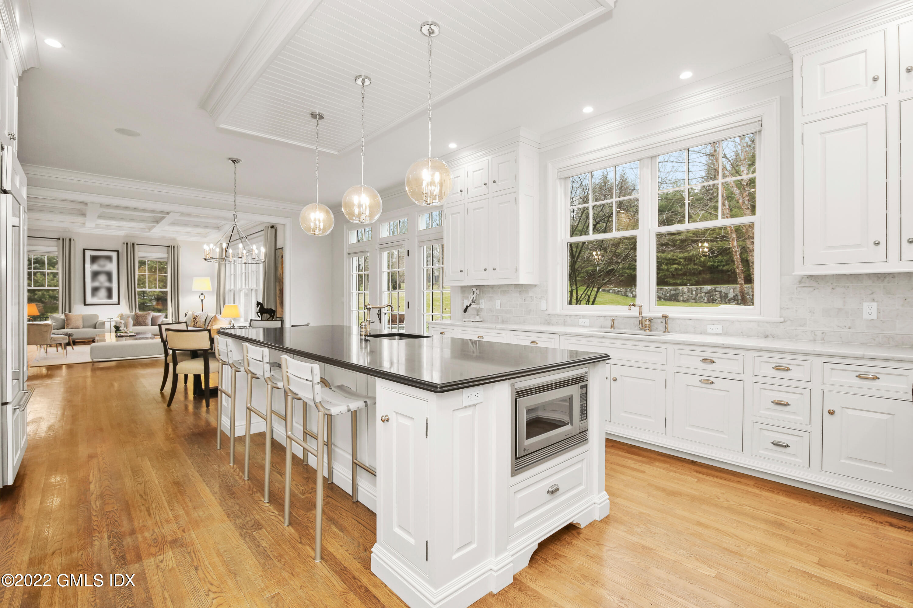 807 Lake Avenue Greenwich, CT 06830 - Photo 9 of 31 a kitchen with stainless steel appliances granite countertop a stove and a wooden floors