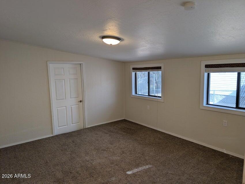 908 North Matterhorn Road Payson, AZ 85541 - Photo 22 of 59 a view of an empty room with a window