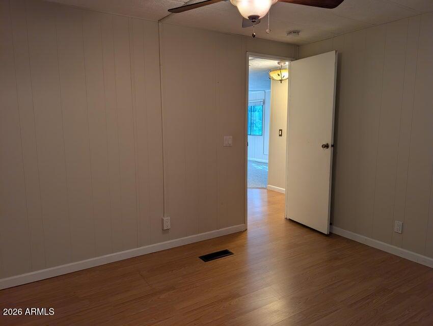 908 North Matterhorn Road Payson, AZ 85541 - Photo 39 of 59 a view of an empty room with wooden floor