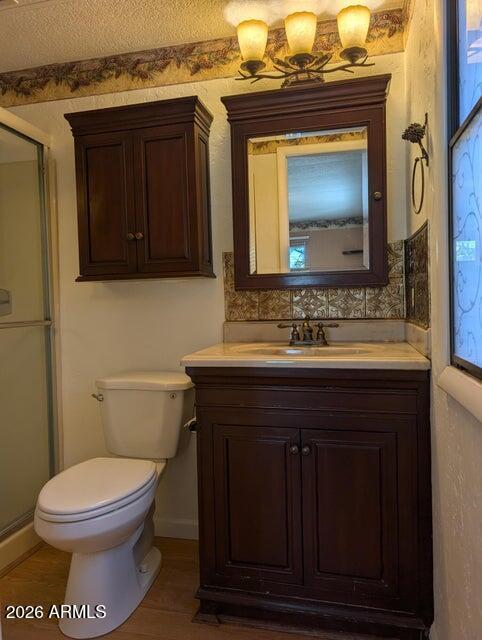 908 North Matterhorn Road Payson, AZ 85541 - Photo 6 of 59 a bathroom with a toilet sink and mirror