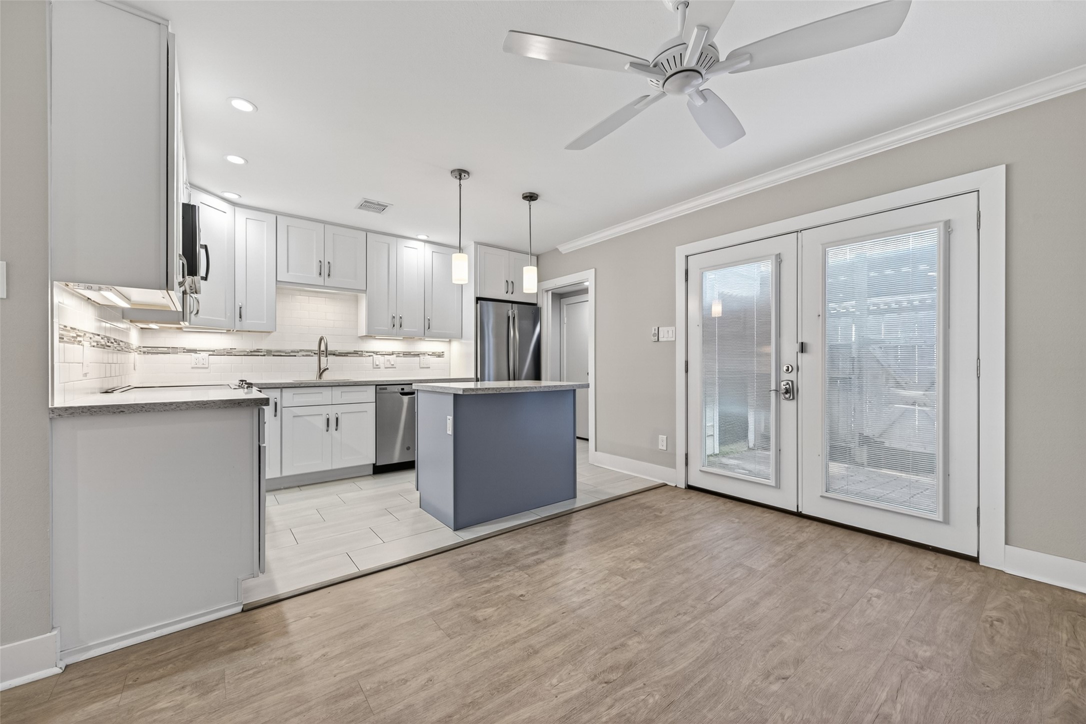 1805 Witte Road, Unit 3 Houston, TX 77080 - Photo 9 of 33 a view of kitchen with granite countertop stainless steel appliances cabinets a sink and a counter top space