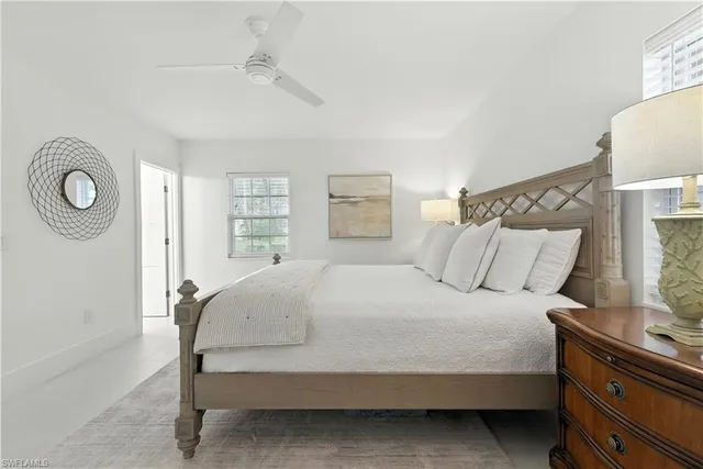 a bedroom with a bed and a closet