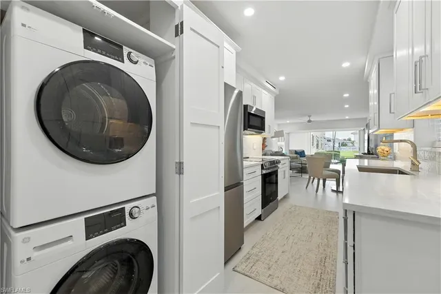 a view of kitchen and washer and dryer
