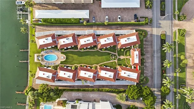 an outdoor living area with furniture and garden view