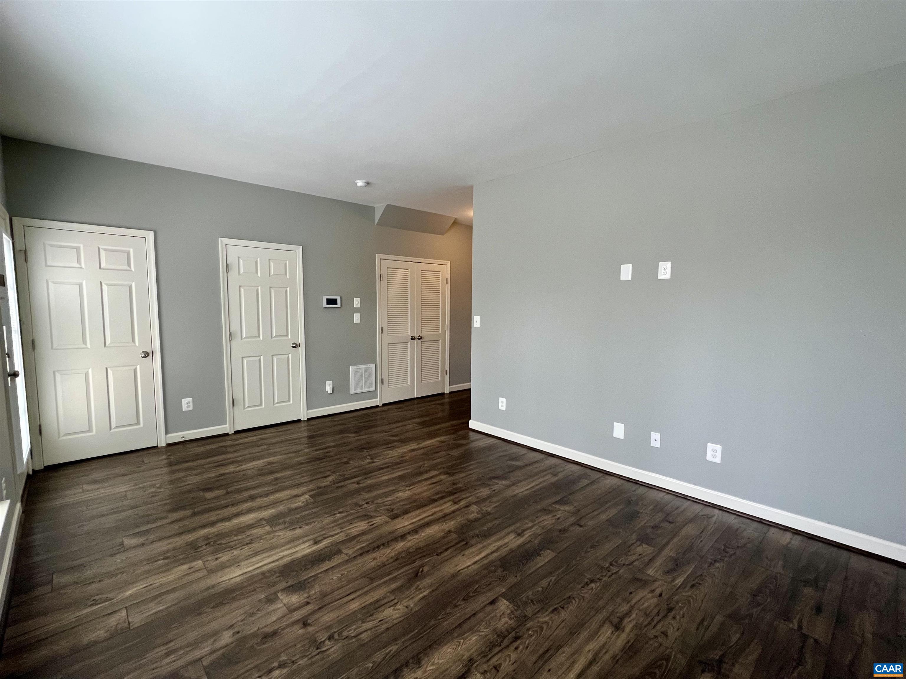 2545 Avemore Pond Road Charlottesville, VA 22911 - Photo 12 of 17 a view of an empty room with wooden floor and closet