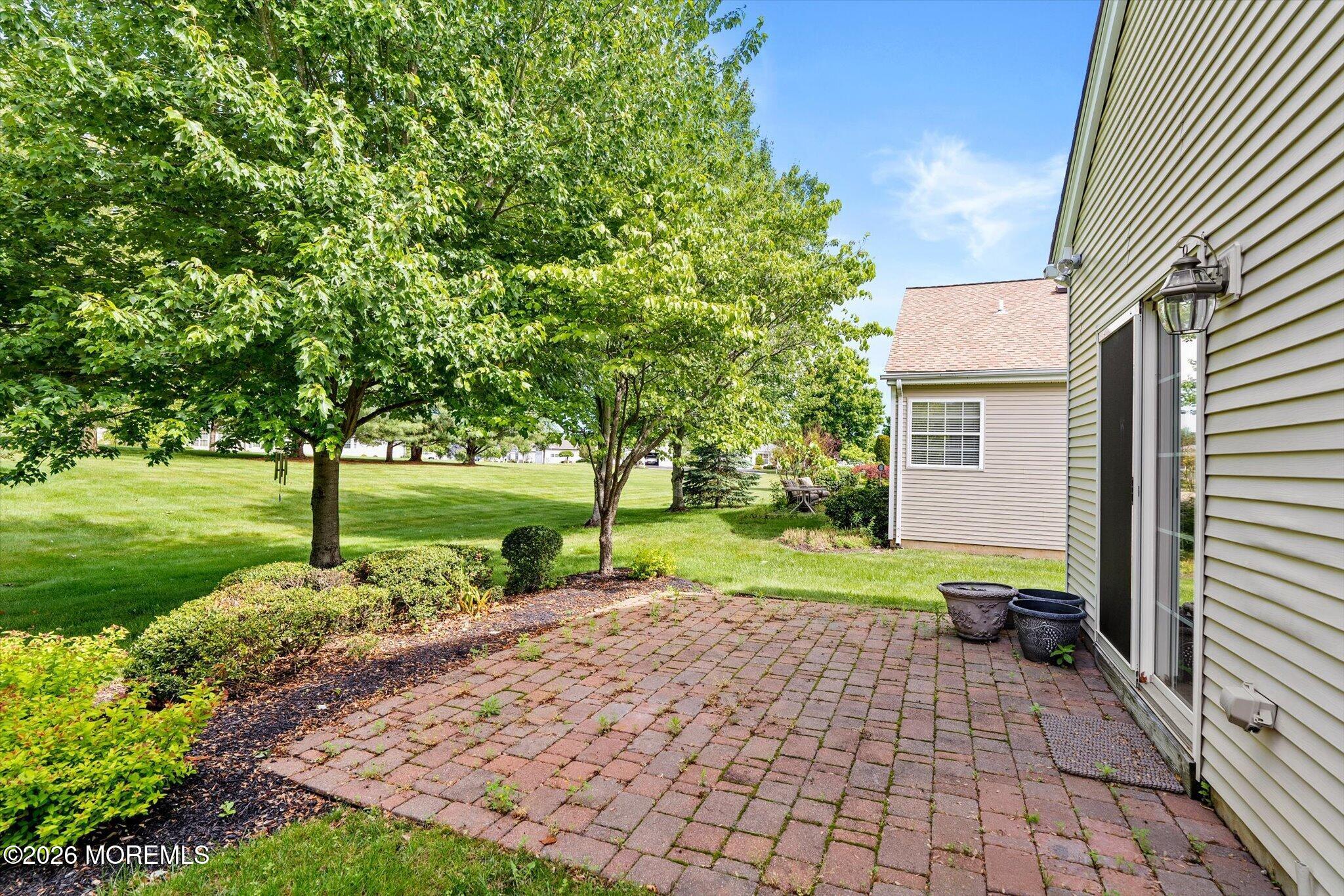 10 Powderhorn Way Allentown, NJ 08501 - Photo 23 of 27 a pathway of a house with a yard