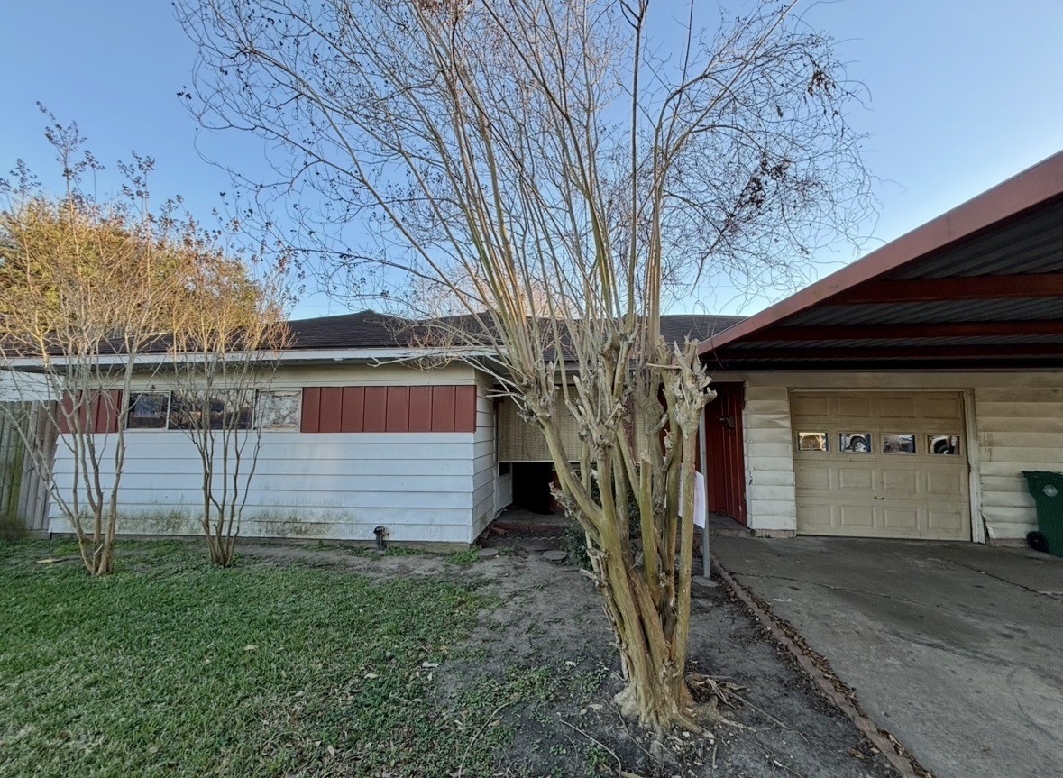 2208 Marshall Street Pasadena, TX 77506 - Photo 7 of 24 a front view of a house with a yard