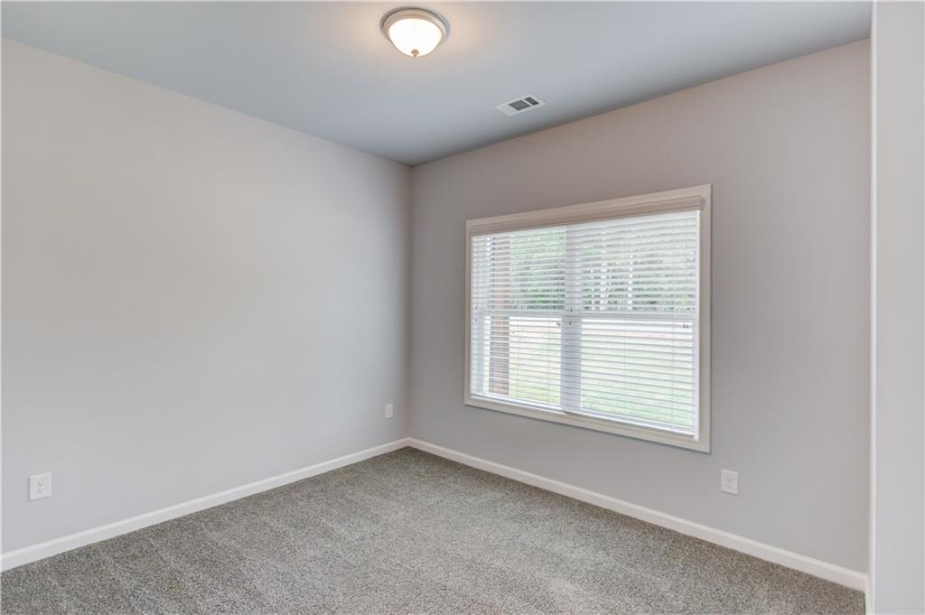 653 Dortch Road Eastanollee, GA 30538 - Photo 22 of 37 an empty room with a window