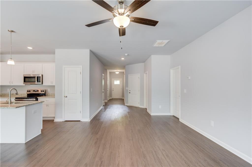 653 Dortch Road Eastanollee, GA 30538 - Photo 10 of 37 a view of a kitchen with a sink and a stove top oven