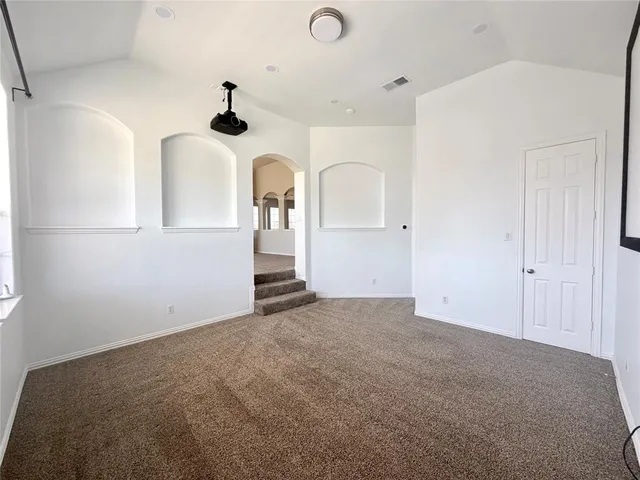a view of empty room with windows