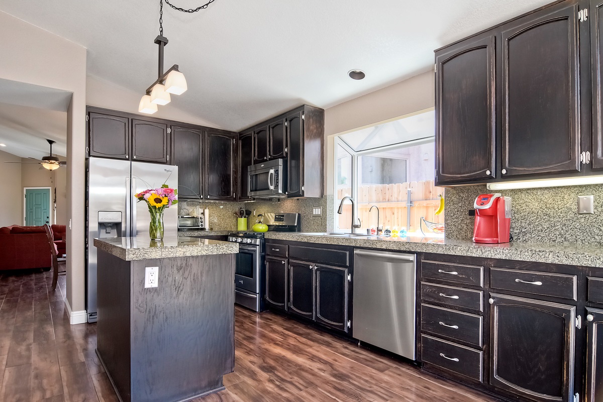 3726 Via Del Rancho Oceanside, CA 92056 - Photo 12 of 25 Bright open kitchen with an island.