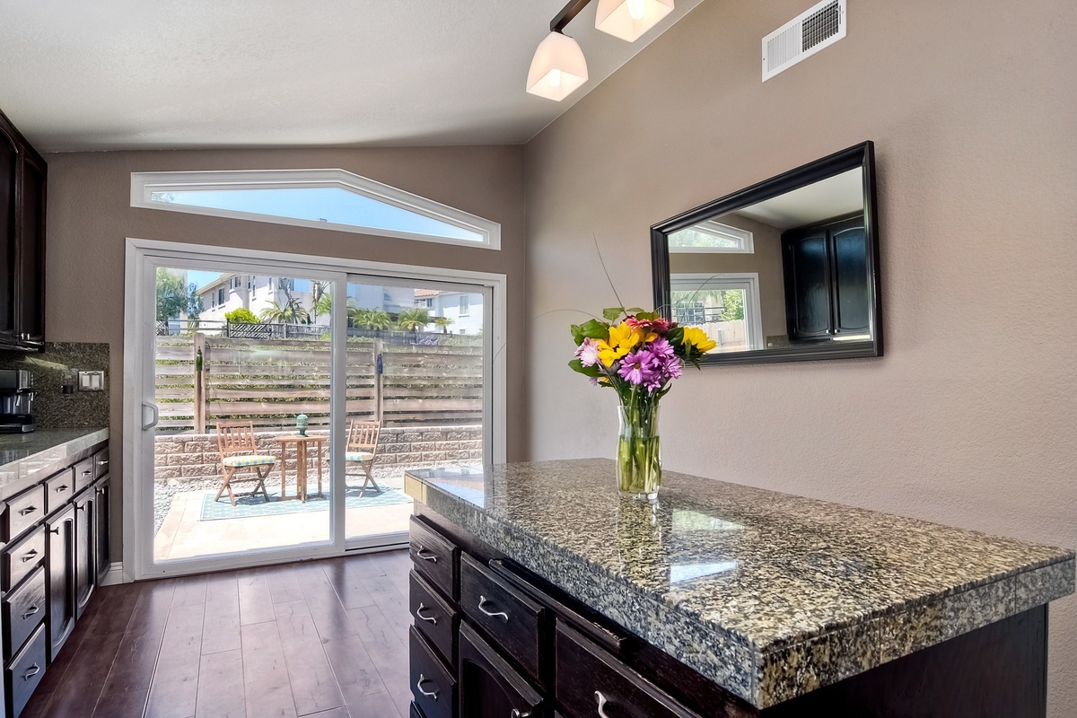 3726 Via Del Rancho Oceanside, CA 92056 - Photo 14 of 25 Slider to the back yard from the kitchen.