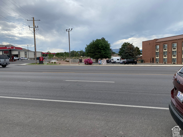 1683 West W Highway Vernal, UT 84078 - Photo 7 of 8 View of asphalt road featuring sidewalks and curbs