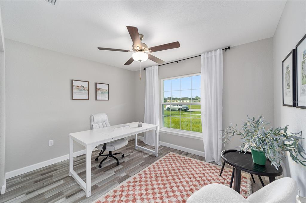 8571 Southwest 131st Place Ocala, FL 34473 - Photo 24 of 32 a workspace with furniture and window