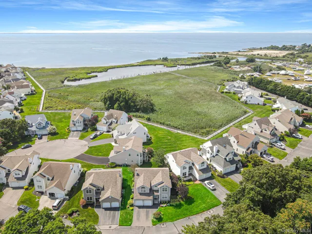 a view of a city with an ocean