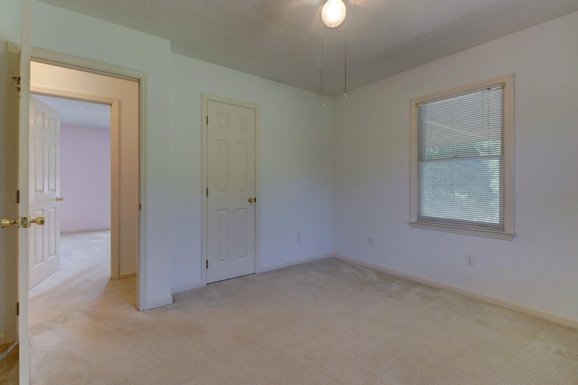 5331 Bethlehem Road Boones Mill, VA 24065 - Photo 17 of 21 an empty room with a empty space and windows