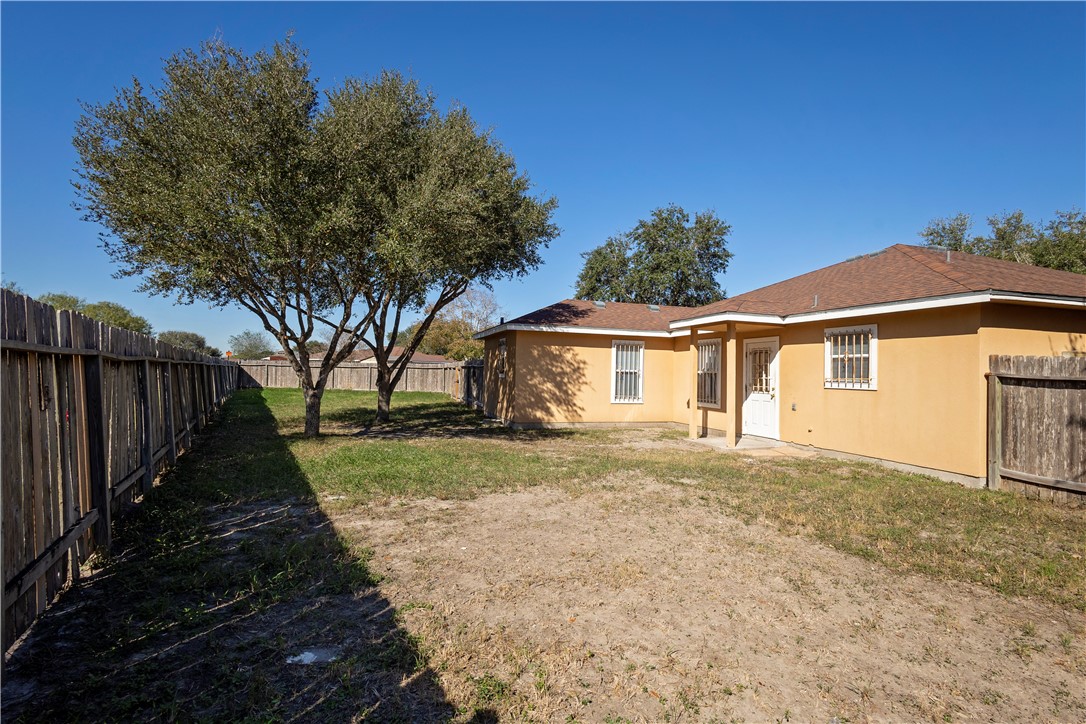 1833 Promise Corpus Christi, TX 78412 - Photo 18 of 19 a front view of a house with a yard