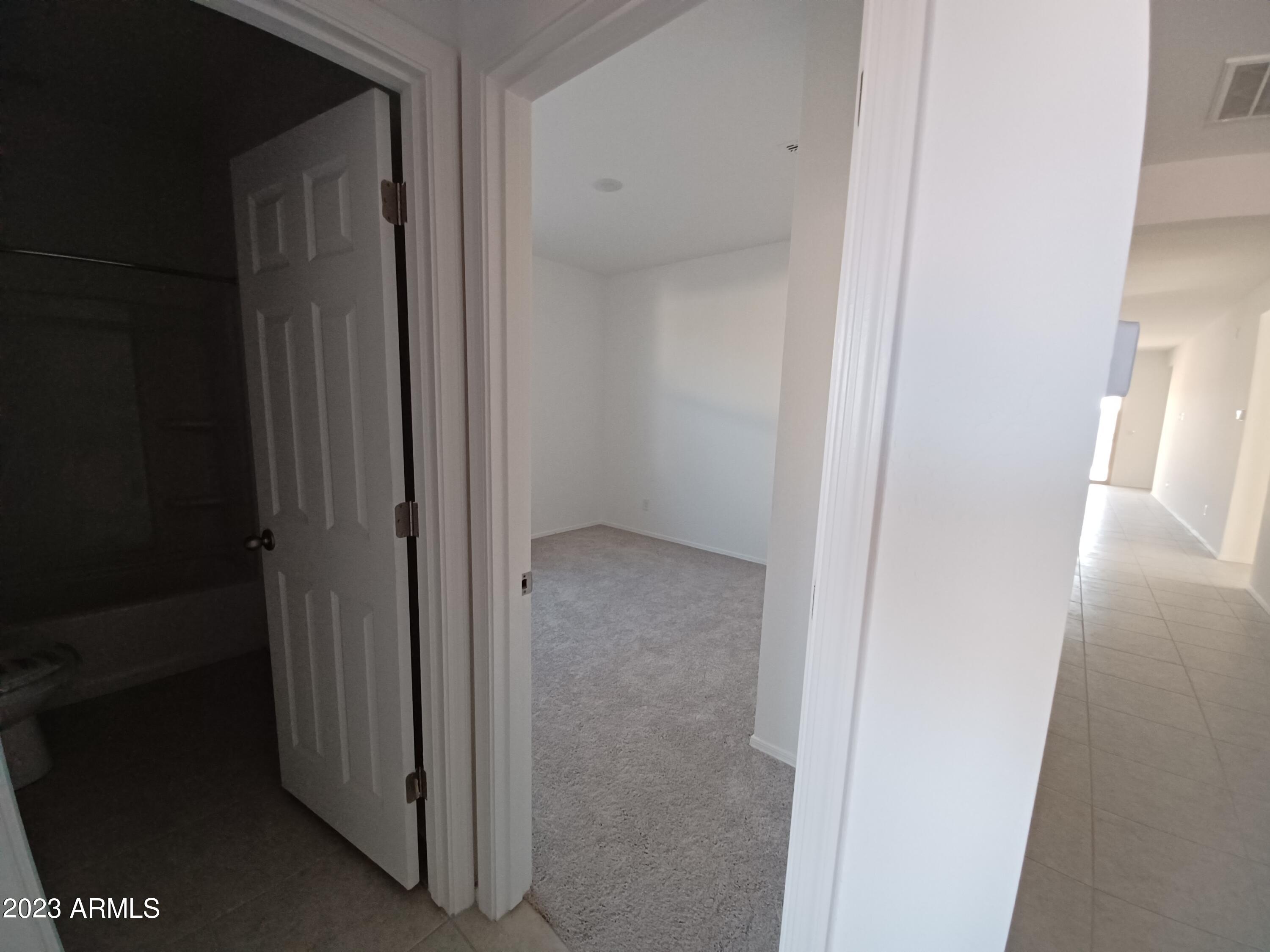 47489 West Cansados Road Maricopa, AZ 85139 - Photo 8 of 29 Lot 103 Bedroom 3 Entry