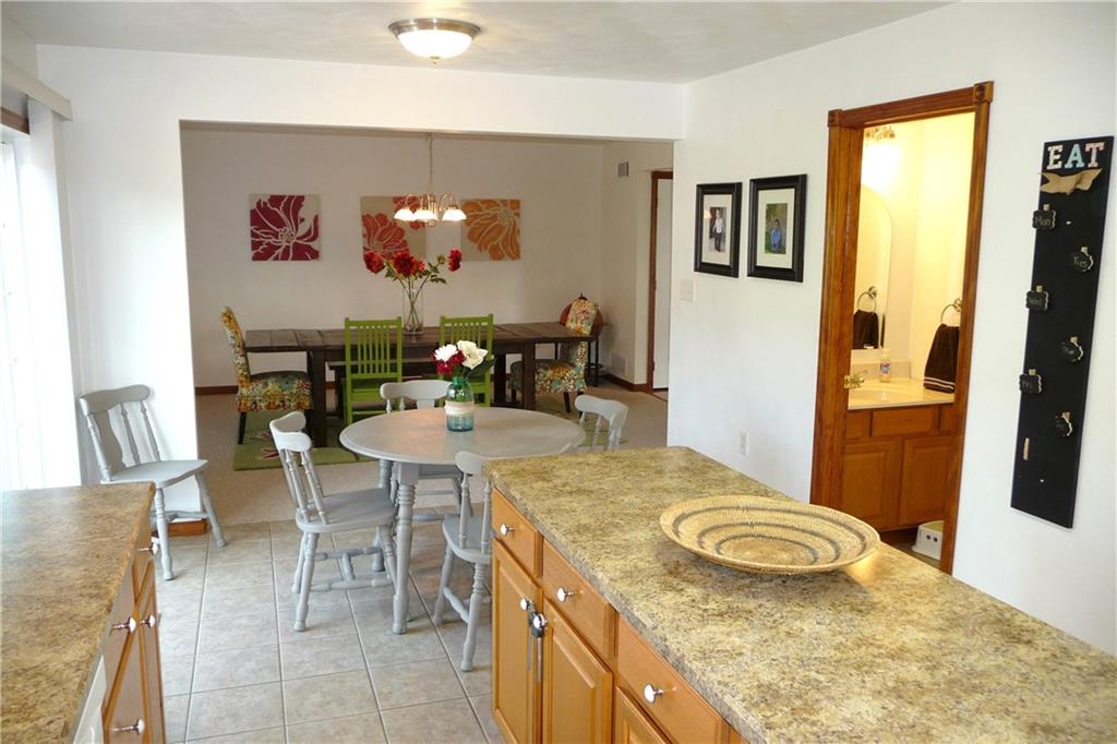 386 Lemmon Road Latrobe, PA 15650 - Photo 6 of 25 Another view of the kitchen with a convenient powder room close by. Dining room is located adjacent to the kitchen.