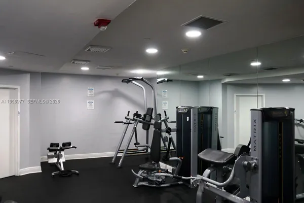 a view of a room with gym equipment