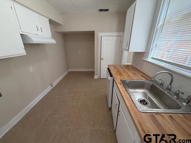 923 North Tyler Avenue Tyler, TX 75702 - Photo 5 of 9 a utility room with dryer and washer