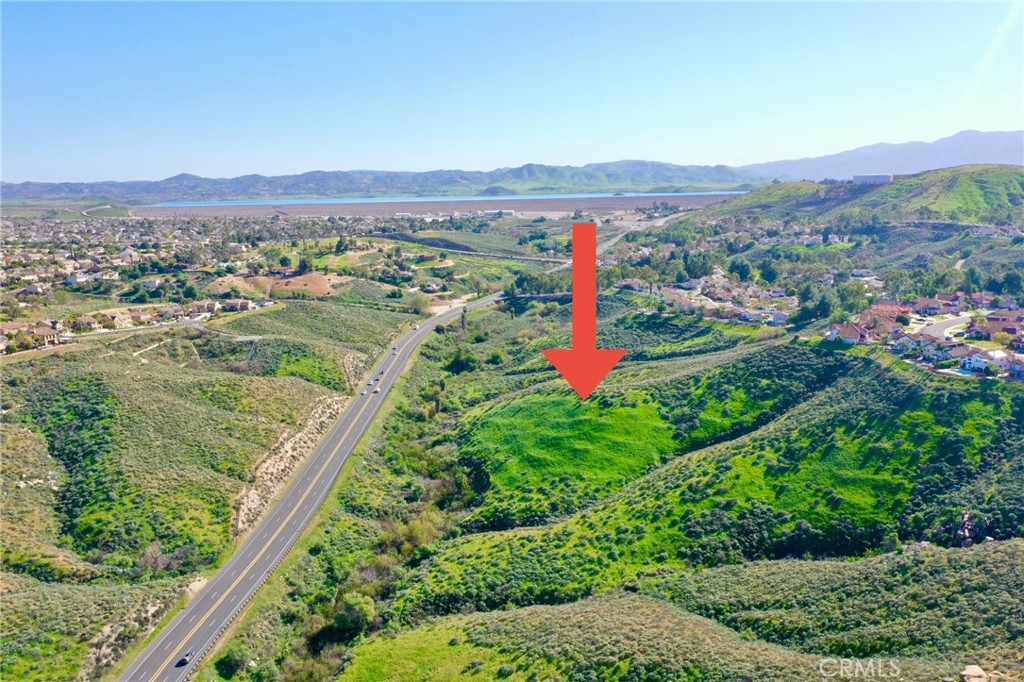 17401 La Sierra Avenue Riverside, CA 92503 - Photo 15 of 16 a view of a lush green hillside and a houses