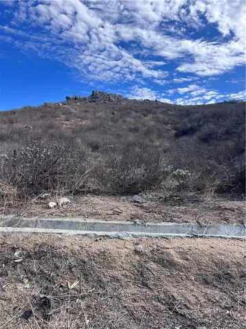 a view of a yard with mountain
