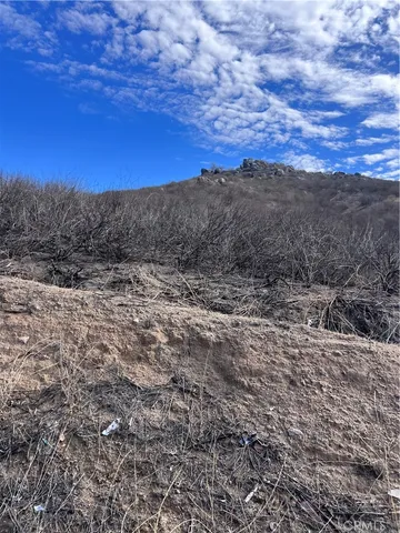 a view of mountain view with lots of trees