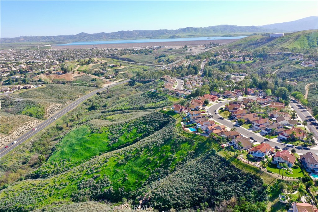 17401 La Sierra Avenue Riverside, CA 92503 - Photo 3 of 16 an aerial view of residential houses with outdoor space and trees