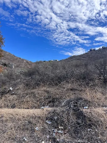 a view of mountain view with lots of trees
